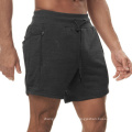 Pantanos pantalones cortos de gimnasio jogger pantalones cortos de sudor de sudor corriendo pantalones cortos de entrenamiento para hombres con bolsillo
